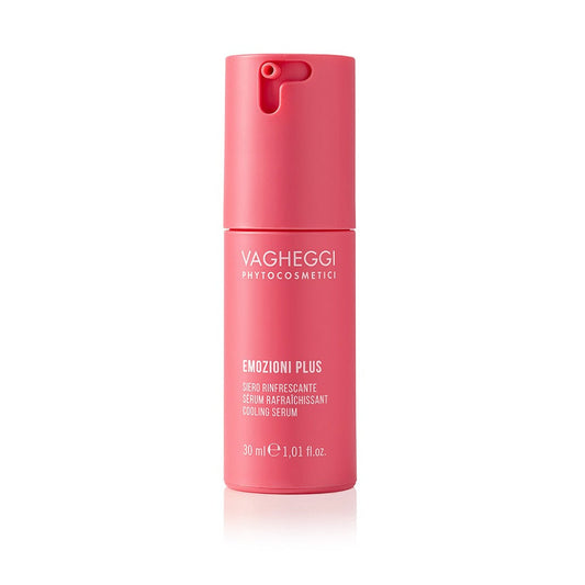 Emozioni Plus Cooling Serum in a pink bottle, soothing and refreshing skin with turmeric and hyaluronic acid.