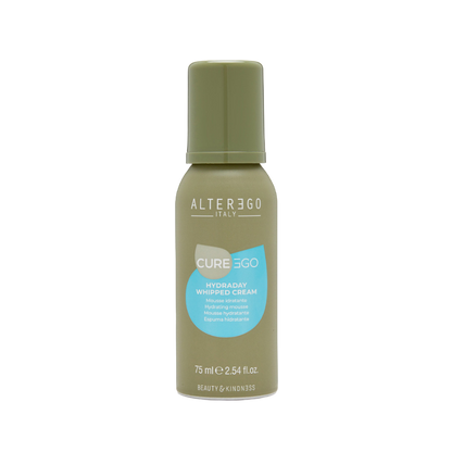 Whipped cream hair product in a green bottle, perfect for improving hydration and shine for all hair types.