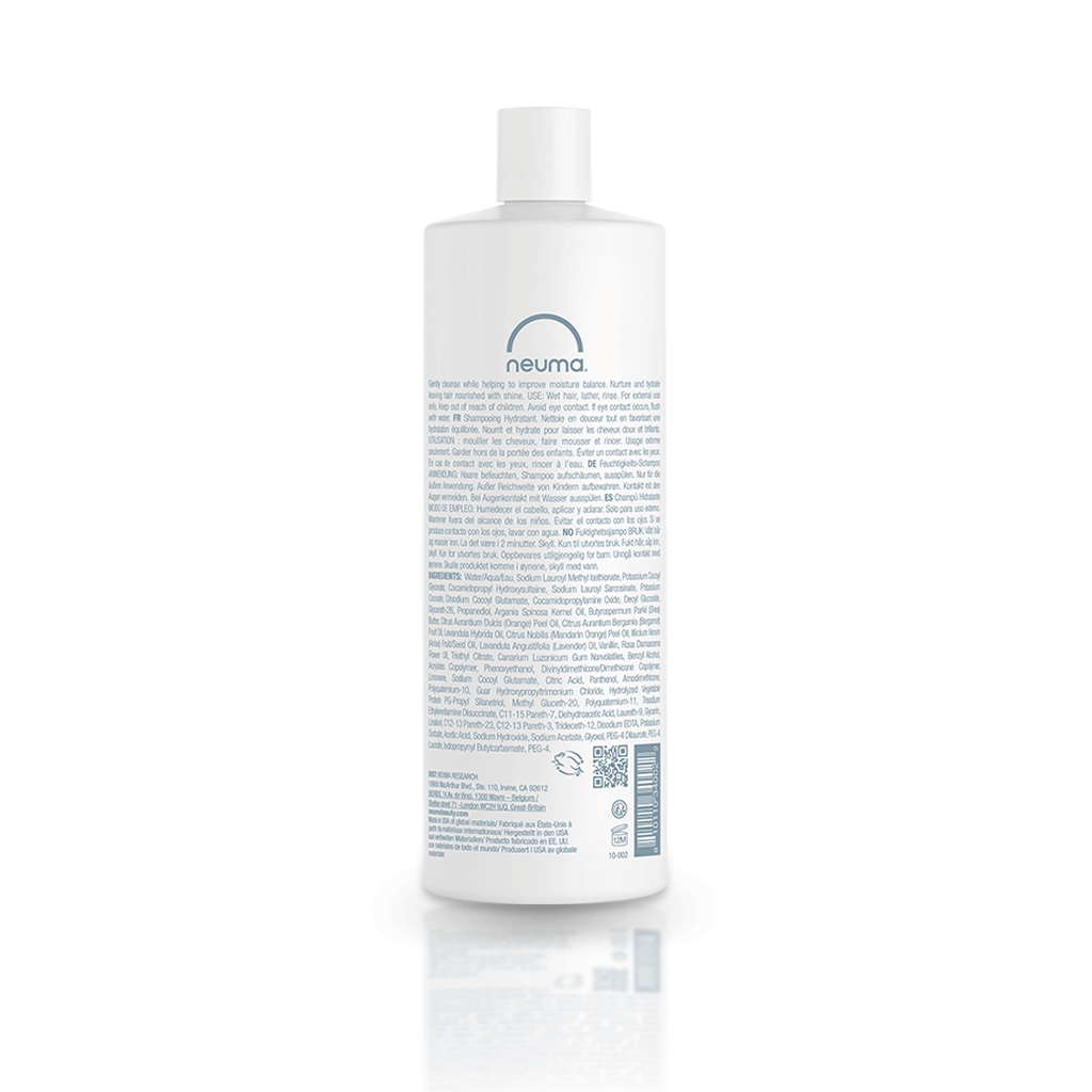 Neuma Moisture Shampoo bottle with product details, featuring a clean, minimalist design.