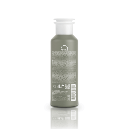 Re Neu Clarifying Shampoo bottle back view, showcasing nourishing ingredients and coconut-derived surfactant.