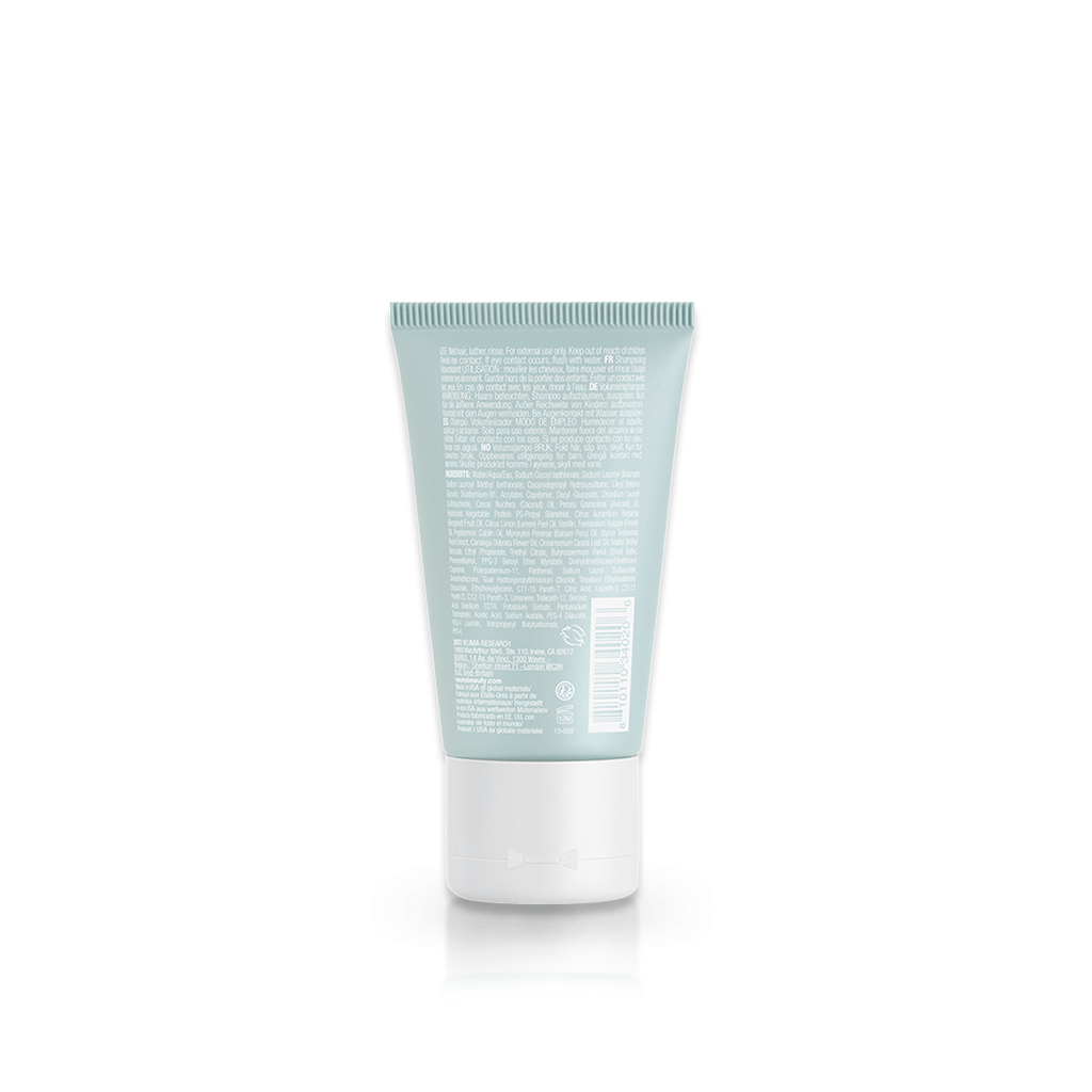 Neu Volume Shampoo bottle, featuring a sulfate-free formula for enhanced body and shine, with detailed ingredients list on back.