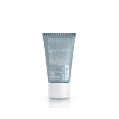 Neu Moisture Shampoo tube displaying ingredient details and instructions for use on a clean background.