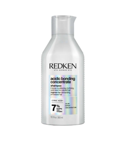 Redken Acidic Bonding Concentrate Shampoo bottle, 300ml, designed for cleansing and repairing damaged hair.