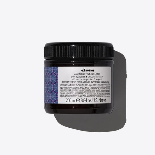 Alchemic Conditioner Silver by Davines in a 250ml jar for enhancing cool blonde tones.