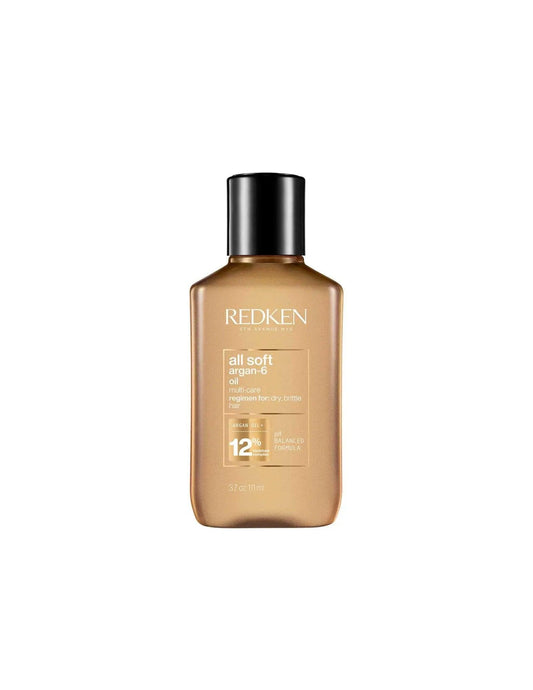 Redken All Soft Argan-6 Oil in a bottle, designed to nourish and add shine to dry hair.