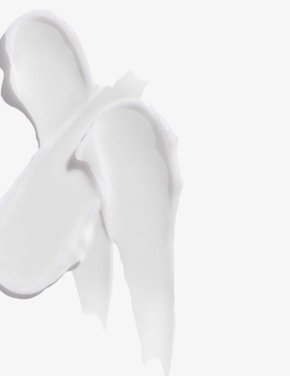 Creamy texture of Redken All Soft Heavy Cream for intense hair conditioning and moisture.