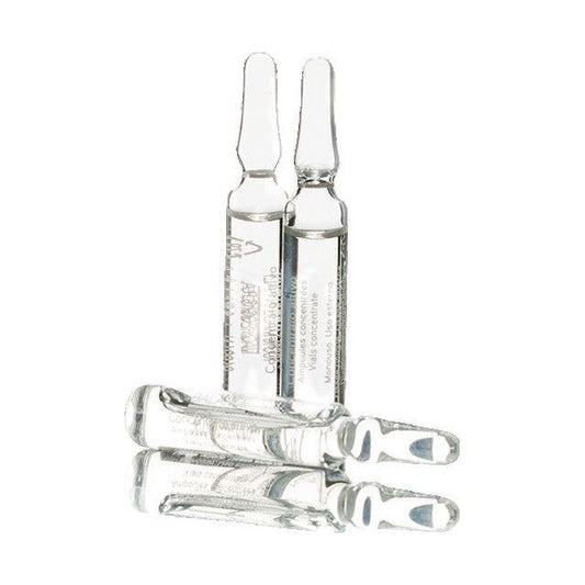 Ampoules Concentrées Balance for oily skin, featuring white willow and organic pineapple extracts, in clear glass vials.