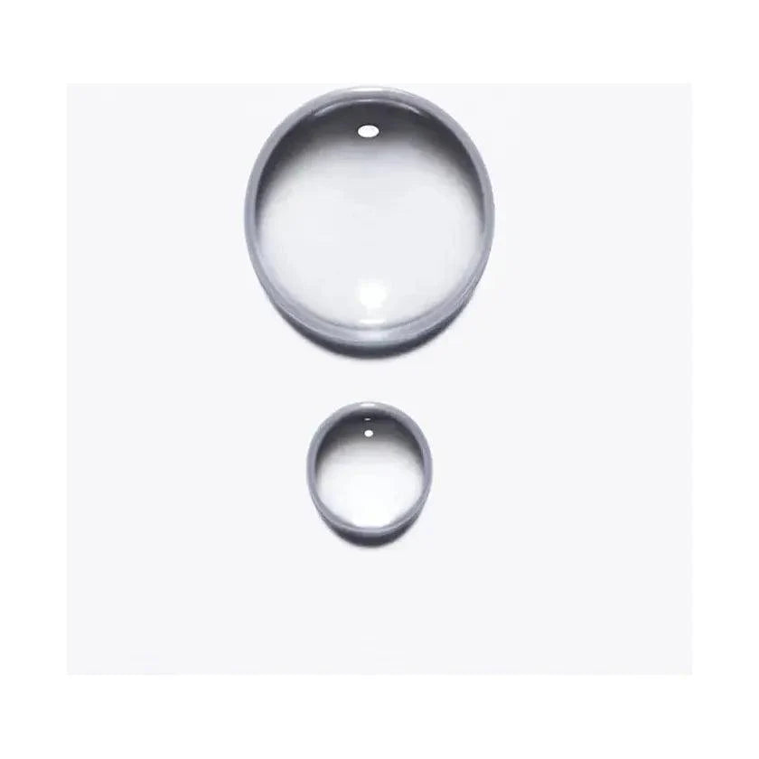 Two convex lens optics on a white background, one large and one small, used for magnification and optical applications.
