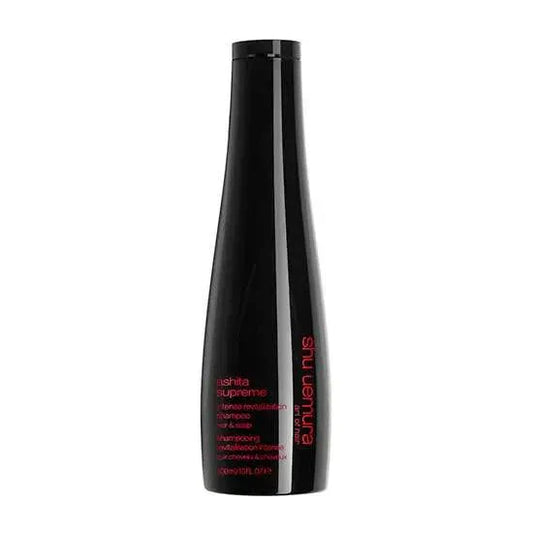 Shu Uemura Ashita Supreme Shampoo bottle for nourishing and strengthening all hair types.
