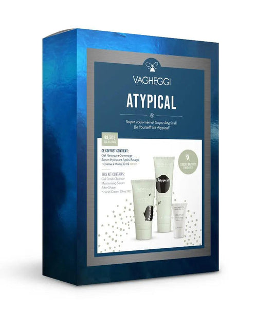 Atypical Christmas Gift Set featuring gel scrub, moisturising serum, after-shave, and hand cream in stylish packaging.