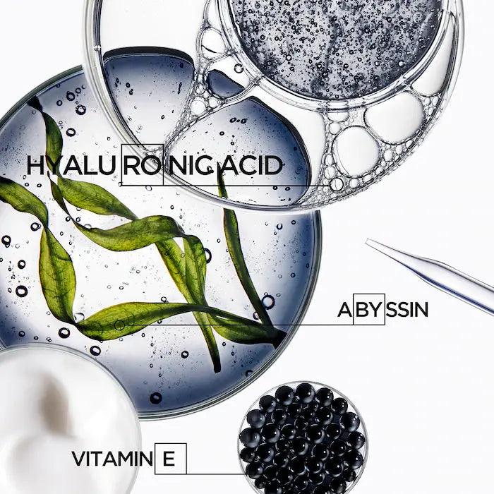 Skincare ingredients including Hyaluronic Acid, Abyssin, Vitamin E in a scientific lab setting for anti-aging and hydration benefits.