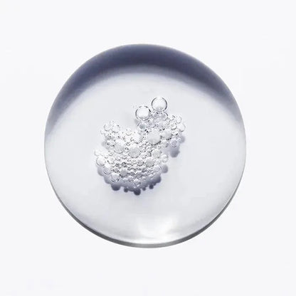 Clear round gel beads in a transparent bowl on a white background.