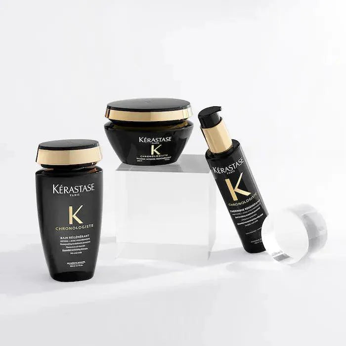 Kérastase Chronologiste hair care products, including shampoo, hair mask, and serum, on display against a white background.