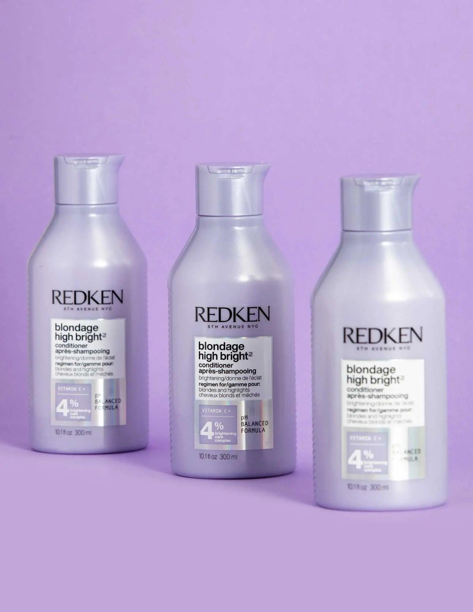 Redken Blondage High Bright Conditioner bottles for vibrant blonde hair care on a lavender background.