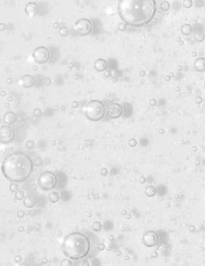 Bubbles in a clear liquid, representing a cleansing and refreshing shampoo formula.