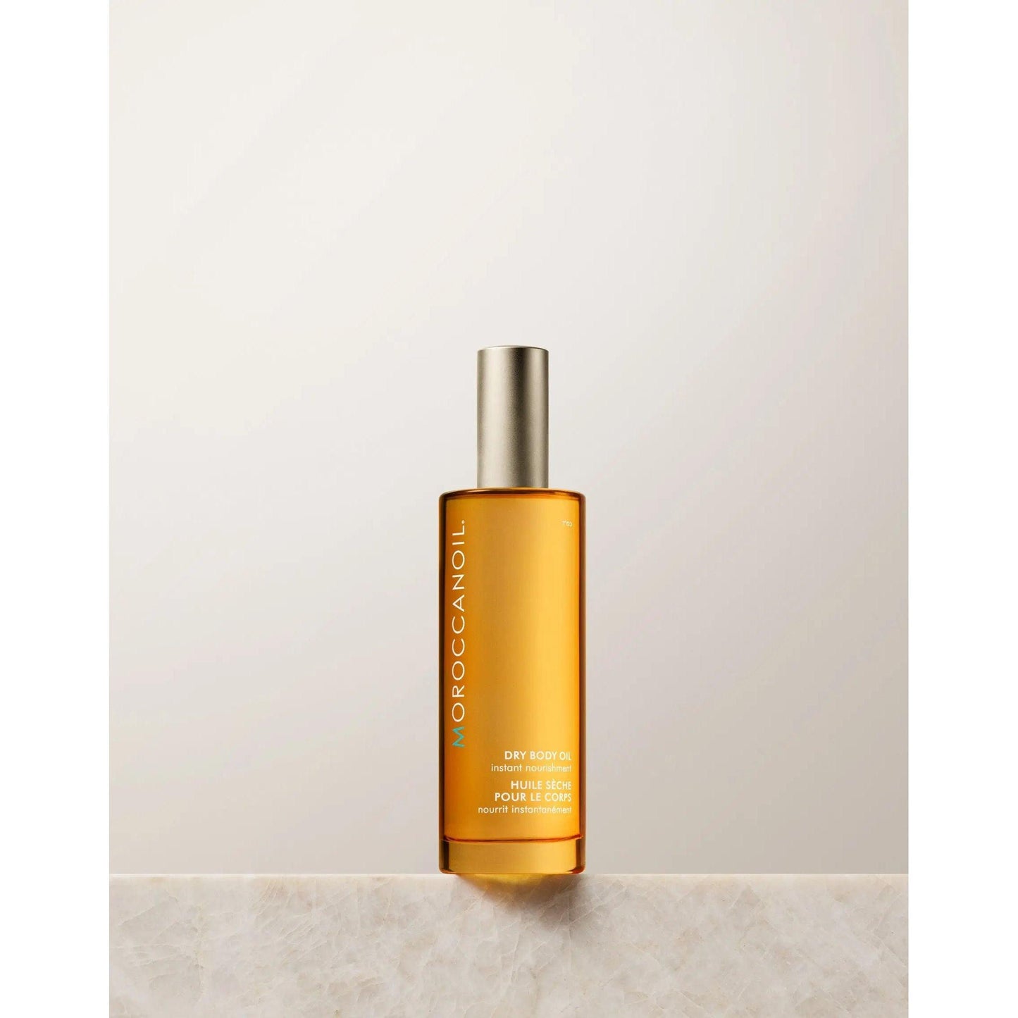 Moroccanoil Body Dry Body Oil bottle with a sleek design, featuring nourishing argan oil for deep skin hydration.