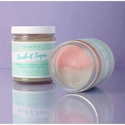 Natural sugar body scrub in jar, featuring cotton candy scent and organic ingredients, displayed on a pastel background.