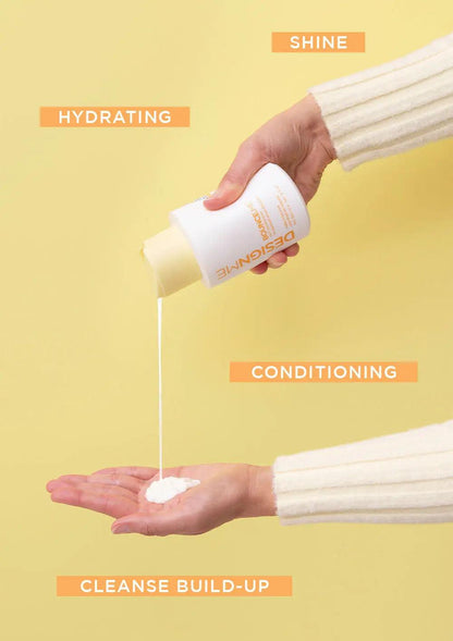 Hand pouring hydrating conditioner from a bottle onto palm, showcasing shine, cleansing build-up, and conditioning benefits.