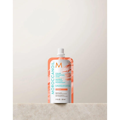 Moroccanoil Color Depositing Mask 30ml in Coral packaging, designed to enhance hair color and shine with argan oil.