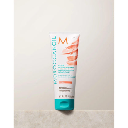 Moroccanoil Color Depositing Mask in Coral, 6.7 fl. oz. tube for vibrant hair color and deep conditioning benefits.