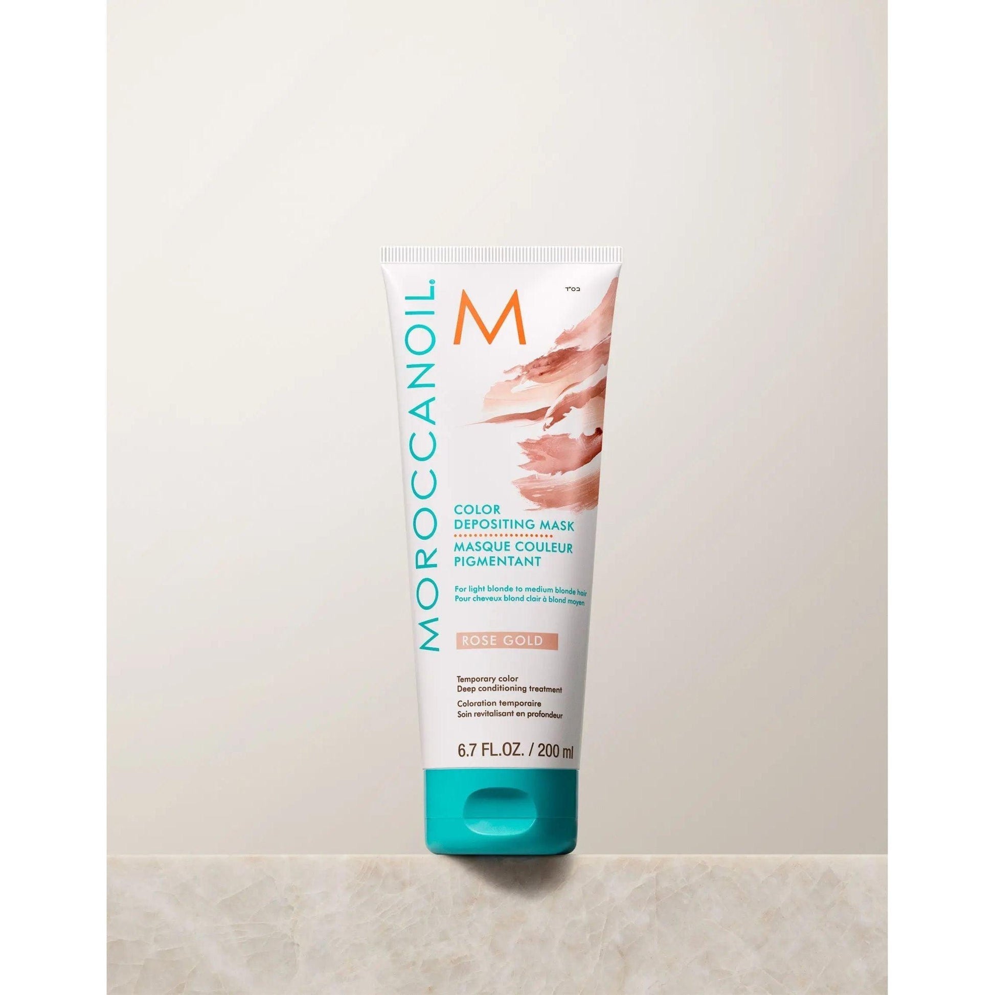 Moroccanoil Color Depositing Mask in Rose Gold, 200ml, deeply conditions and refreshes hair color.