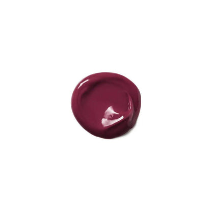 Moroccanoil Color Depositing Mask in rich burgundy shade, ideal for refreshing hair color and enhancing shine.