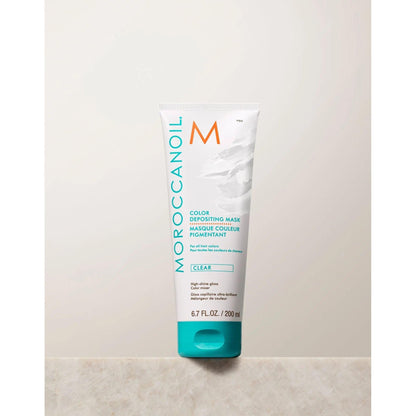 Moroccanoil Color Depositing Mask in clear, 200 ml tube for rejuvenating hair color and deep conditioning.