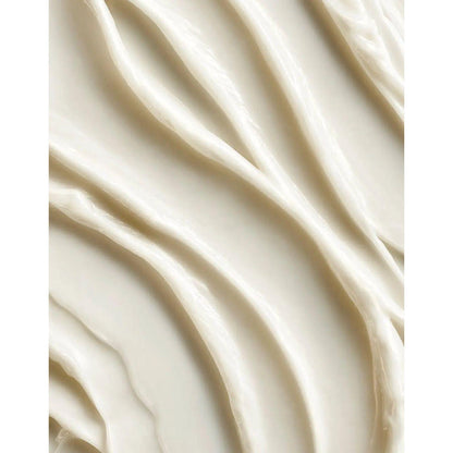 Close-up of a creamy texture from Moroccanoil Color Depositing Mask, showcasing its smooth and rich formulation.