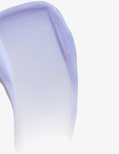 Smooth application of purple Redken Color Extend Blondage Conditioner for blonde and highlighted hair.