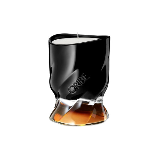 Elegant Côte d'Azur scented candle by ORIBE in a chic black and clear glass design.