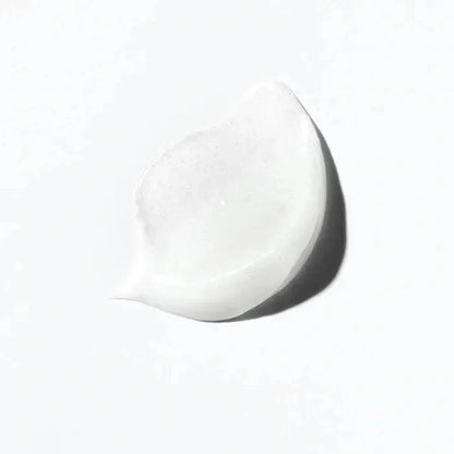 Curl Manifesto nourishing hair mask cream on a white background for intense moisture and shine.