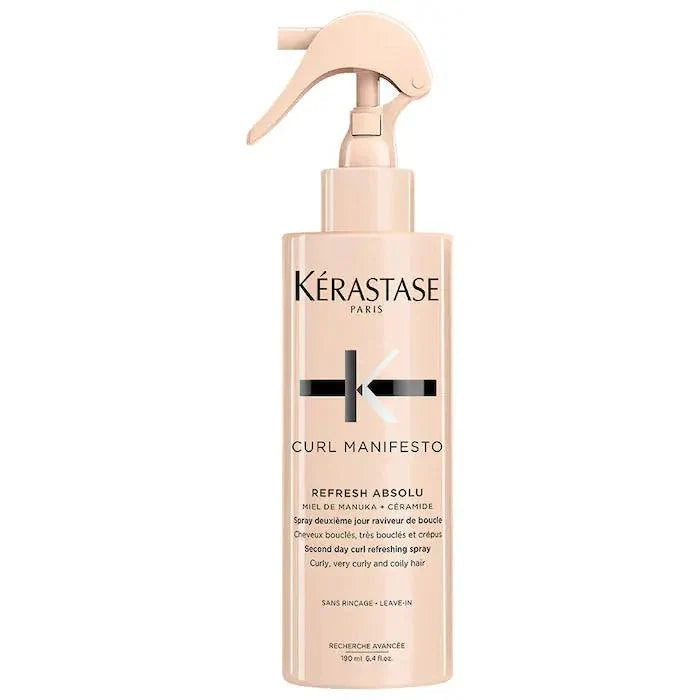 Kérastase Curl Manifesto Refresh Absolu spray bottle for rejuvenating and restyling curls on all hair types.
