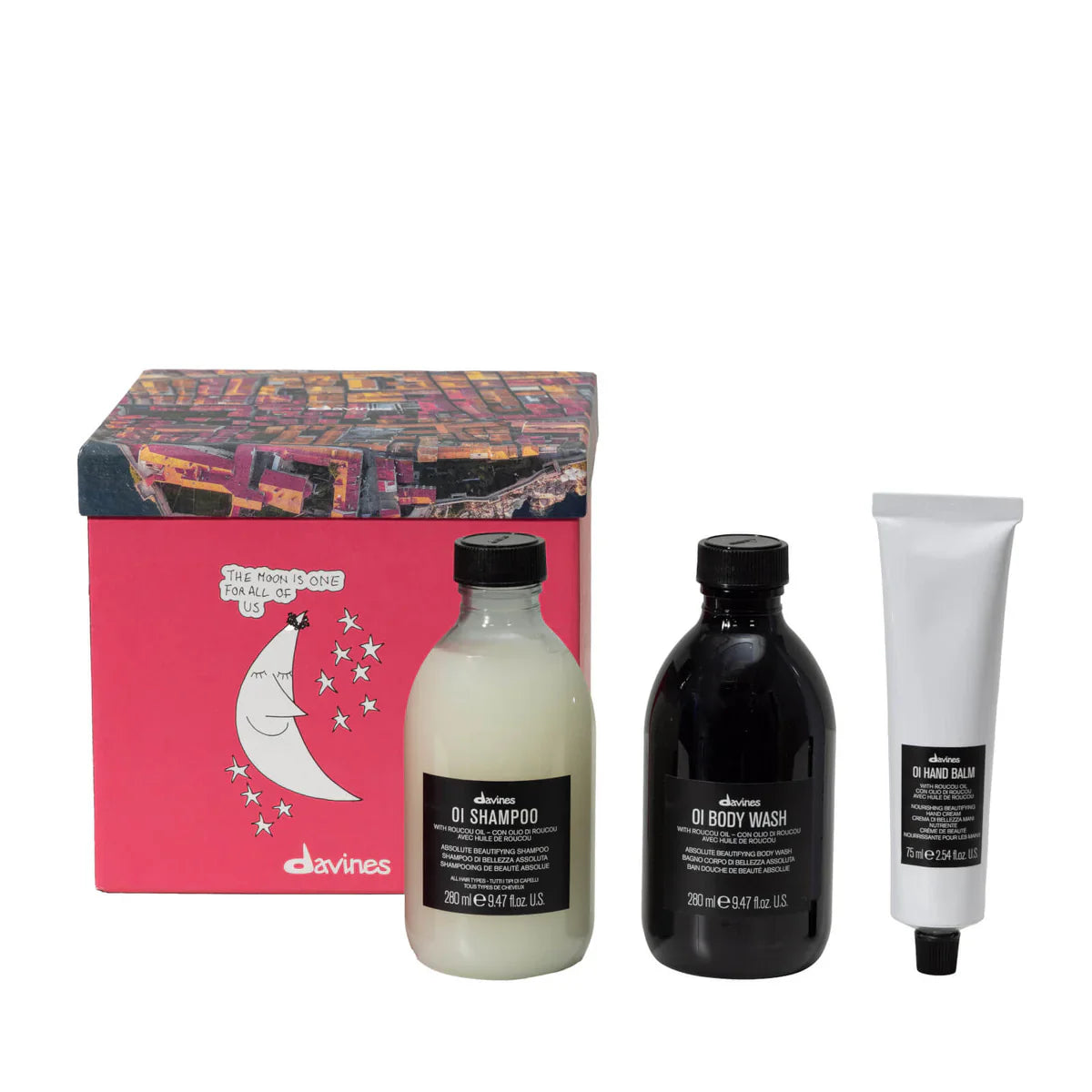 Davines OI Lifestyle Gift Set featuring OI Shampoo, OI Body Wash, and OI Hand Balm in a decorative box.