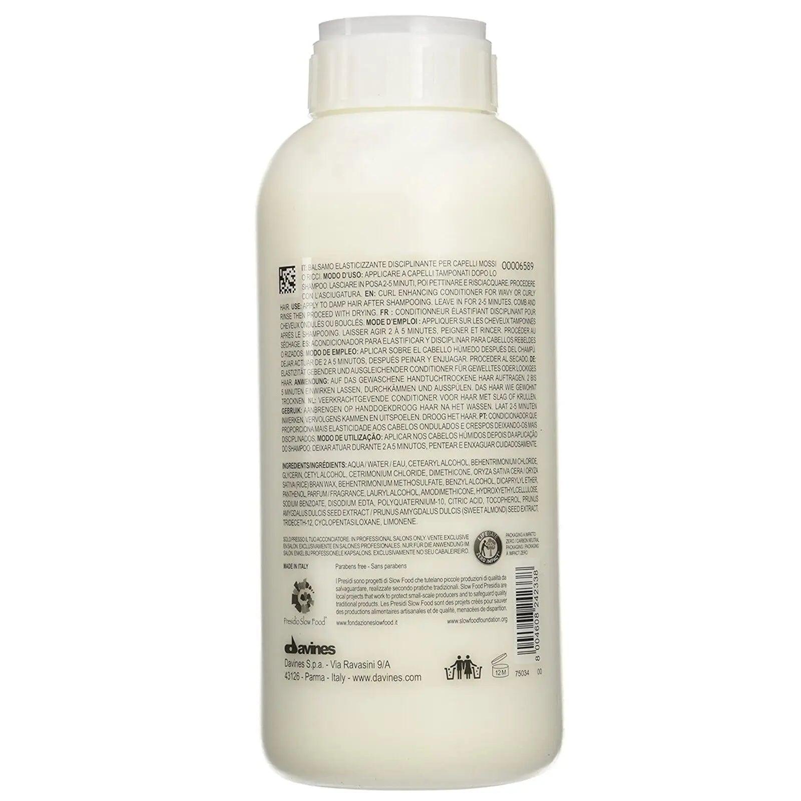 Back view of Davines Love Curl Pro Shampoo bottle, showcasing product details and ingredients for curly hair care.