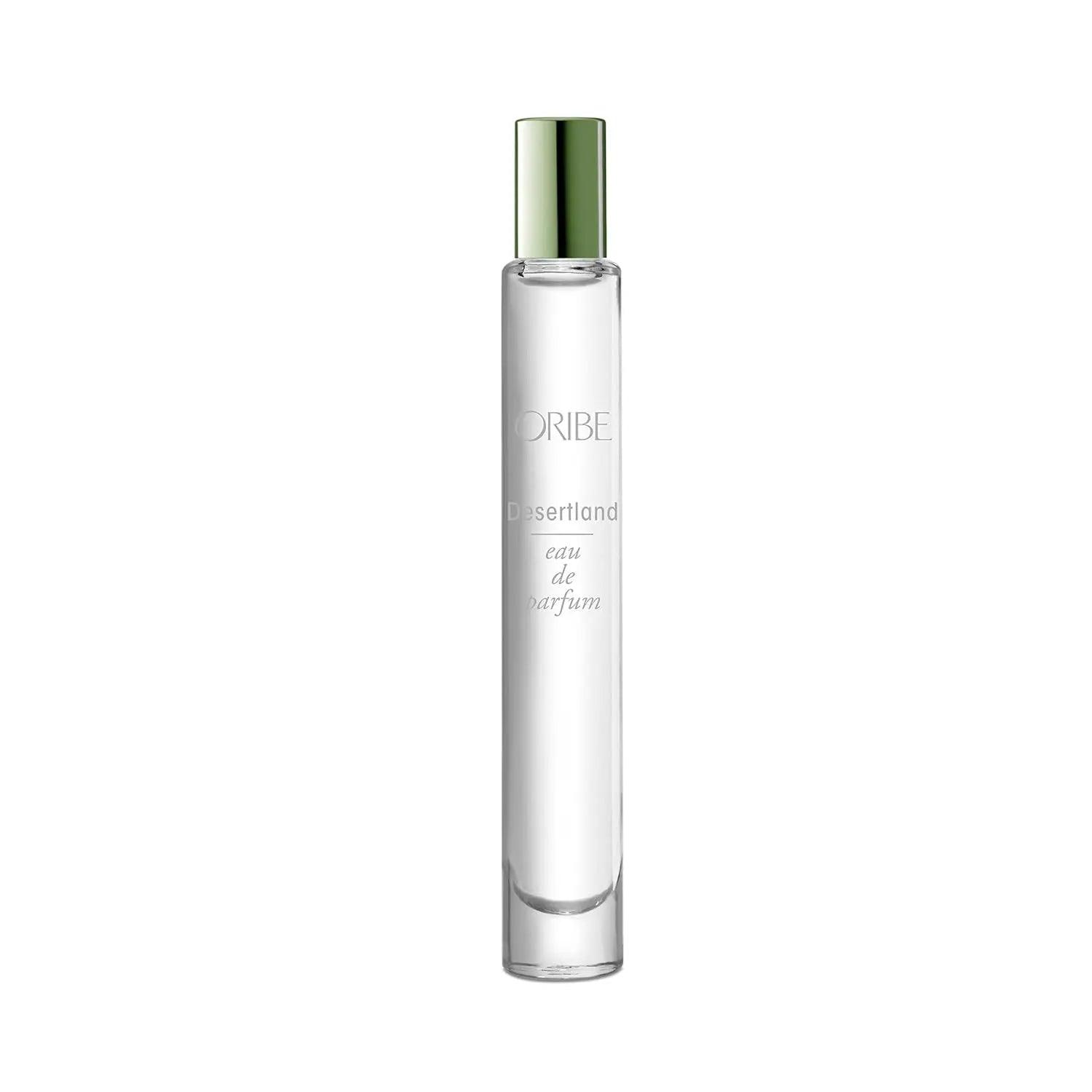 Desertland Eau De Parfum travel spray, featuring notes of juniper berry, lavender, and Texas cedarwood in elegant packaging.
