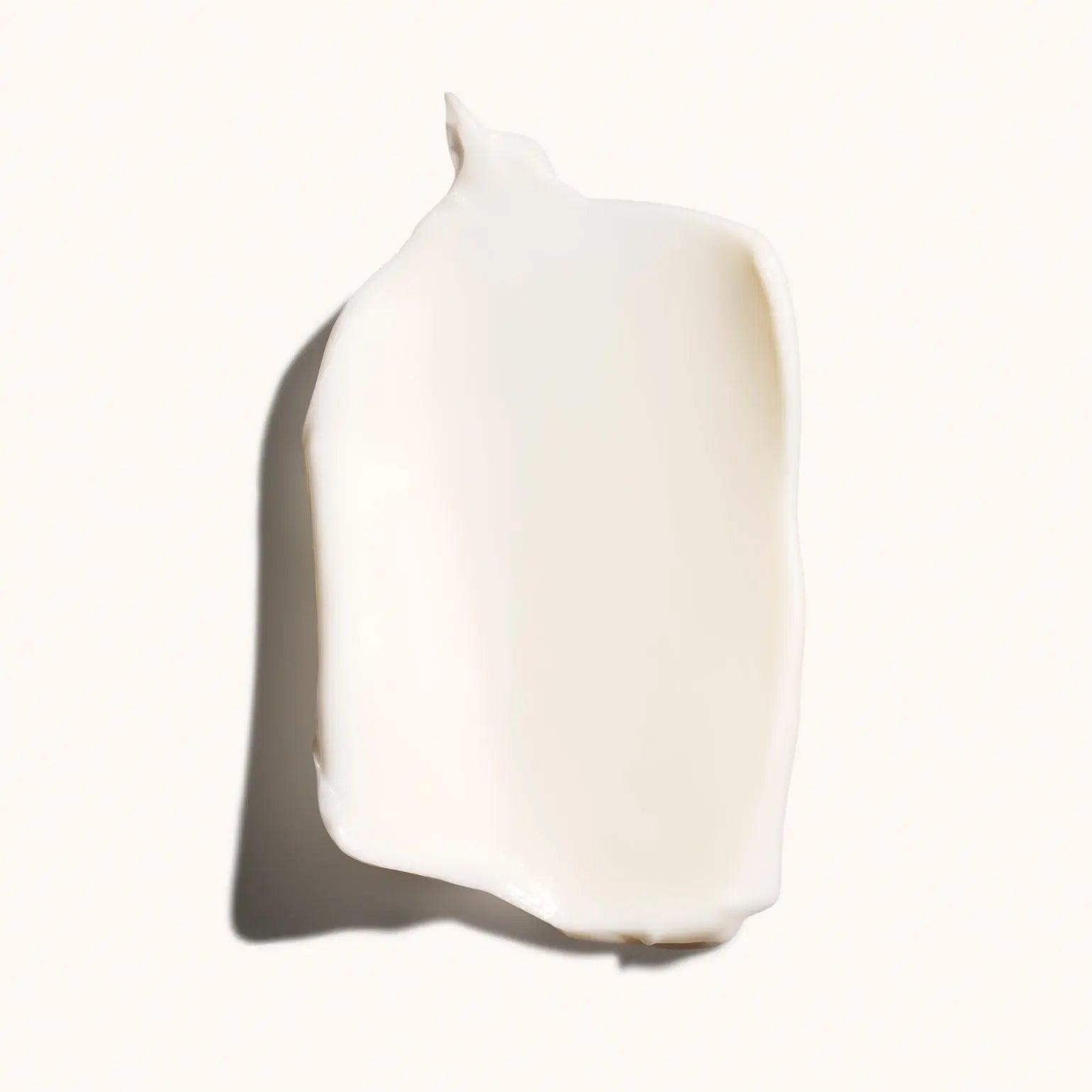 Smooth swatch of Desertland Restorative Body Crème showcasing its rich, creamy texture.