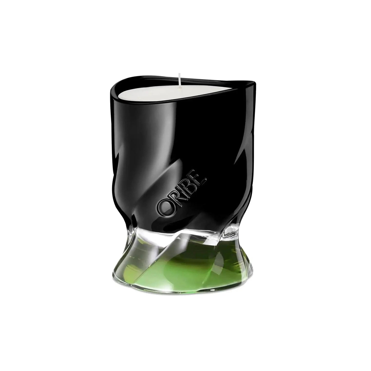 Oribe Desertland scented candle in a stylish black and green holder, showcasing a modern design perfect for home decor.