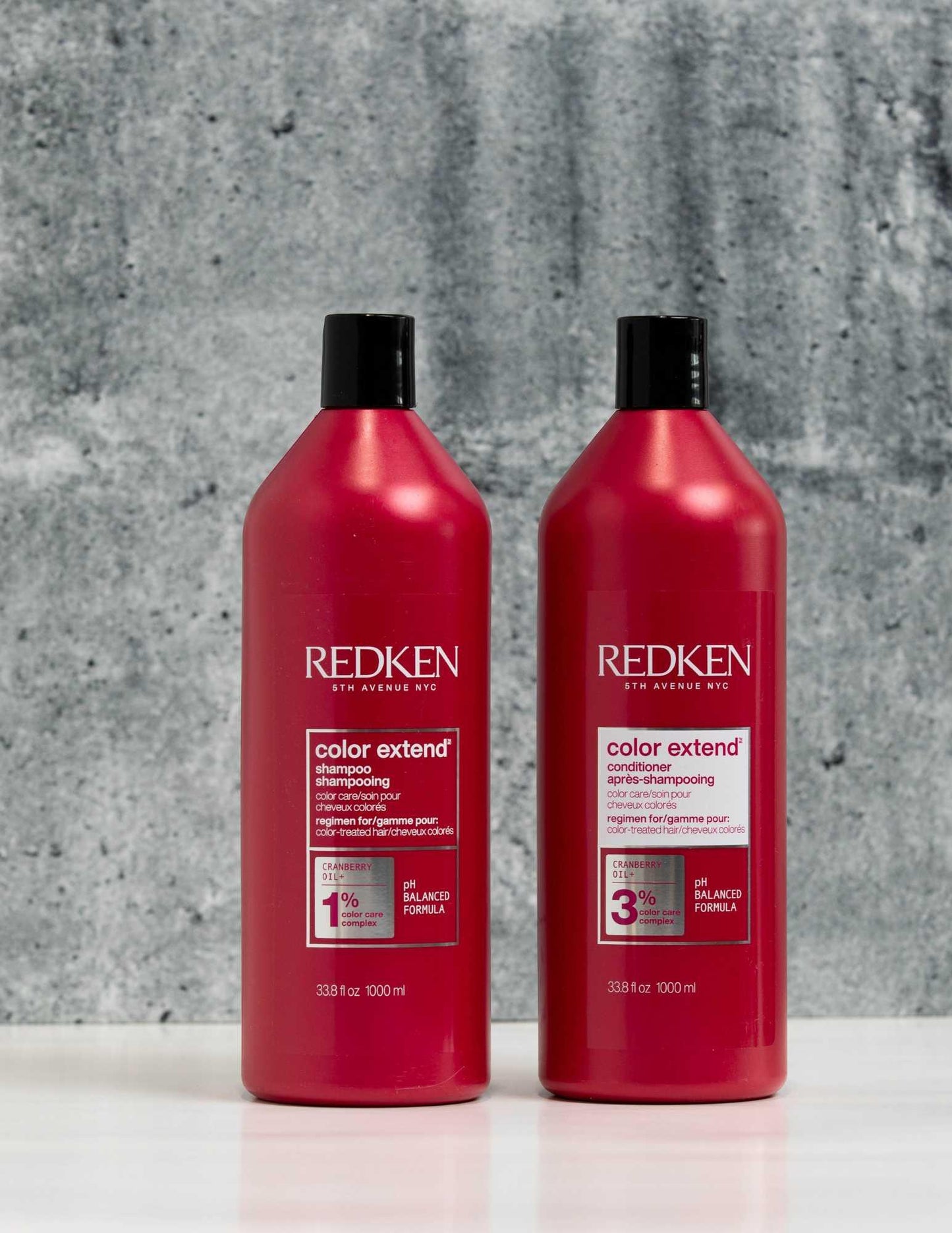 Redken Duo Liters Color Extend Shampoo and Conditioner bottles for color-treated hair care.