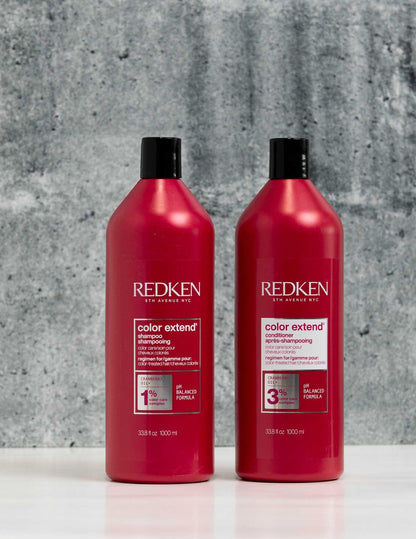 Redken Duo Liters Color Extend Shampoo and Conditioner bottles for color-treated hair care.