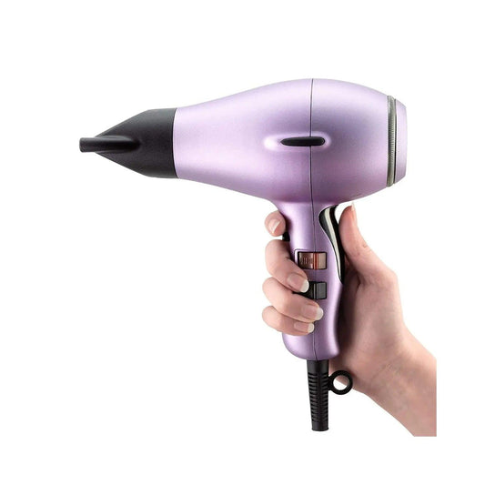 Hand holding the Elchim 8th Sense RUN Hair Dryer in Lily Rose Edition, showcasing its sleek design and professional features.