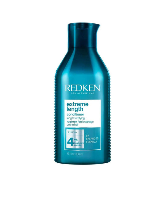 Redken Extreme Length Conditioner bottle designed for promoting stronger, healthier hair and length retention.