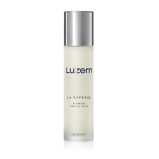 La Defense firming facial mist by Luzern in sleek packaging for advanced skincare and firming benefits.
