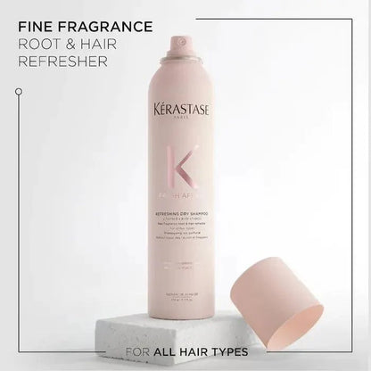 Kérastase fine fragrance root and hair refresher dry shampoo for all hair types in pink bottle with cap on white background