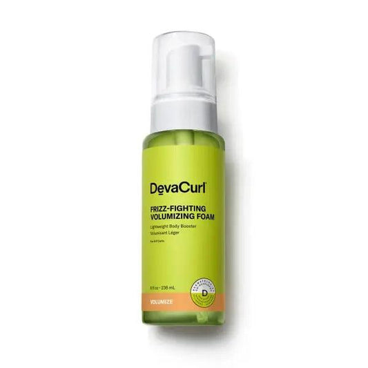 DevaCurl Frizz-Fighting Volumizing Foam in a green bottle for enhanced curls and frizz control.