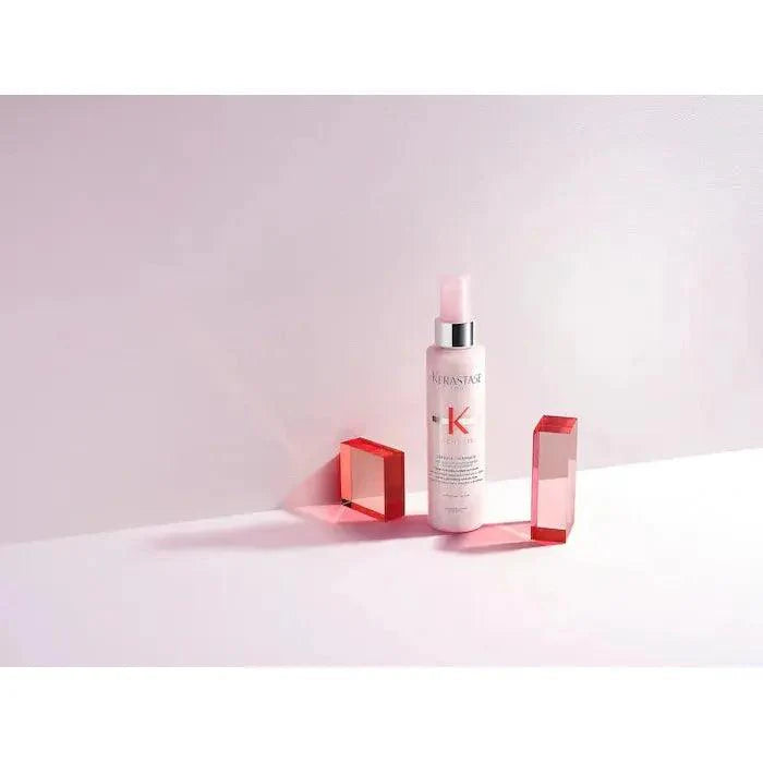 Kerastase beauty product with red accents on a minimalistic white background. Perfect for hair care and beauty routines.