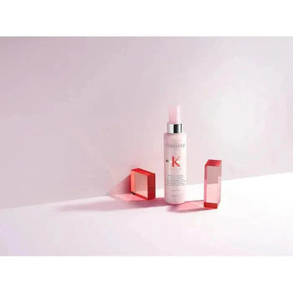 Kerastase beauty product with red accents on a minimalistic white background. Perfect for hair care and beauty routines.