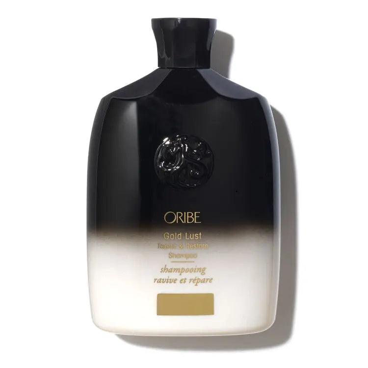 Oribe Gold Lust Repair & Restore Shampoo Bottle for luxurious hair care and revitalization