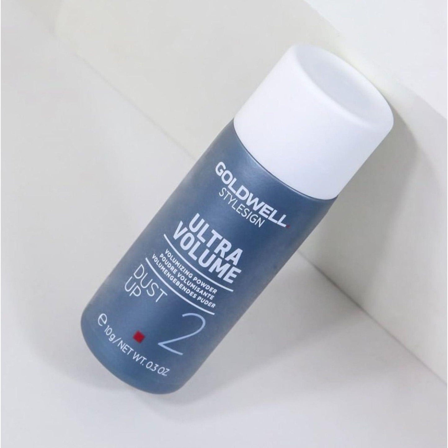 Goldwell Stylesign Ultra Volume Dust Up Volumizing Powder bottle for flexible volume and texture in hair styling.