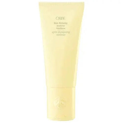Oribe Hair Alchemy Resilience Conditioner in yellow tube for strength, softness, and moisture for hair care.