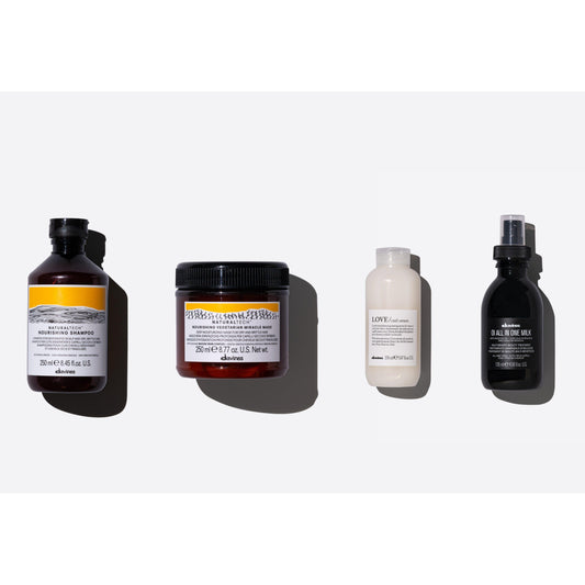 Davines Heatless Natural Waves Set featuring nourishing shampoo, miracle mask, curl cream, and all-in-one milk.